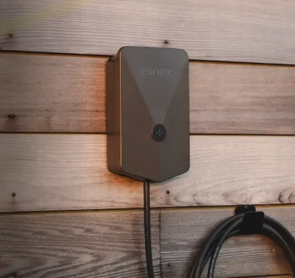 Evnex EV charger installed on a timber exterior wall