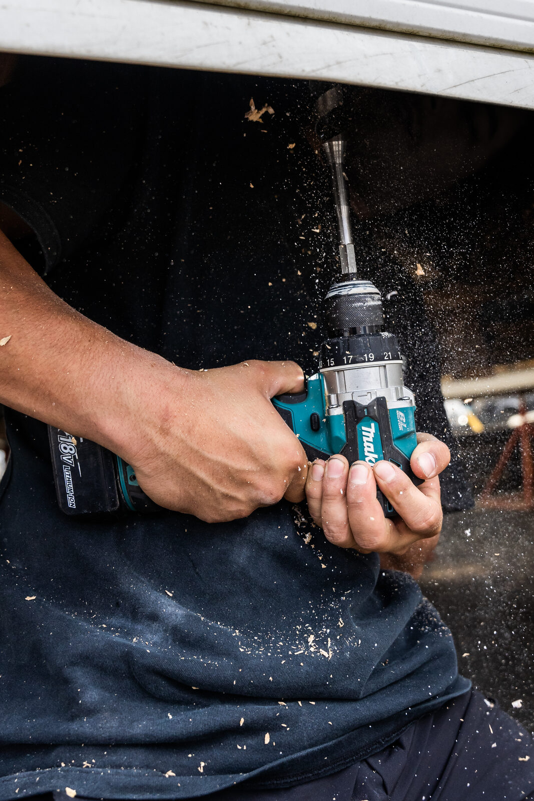CES Electrical technician drilling during residential pre-wire